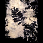 Black rayon discharged velvet scarf with printed leaves on blue and silver backtround